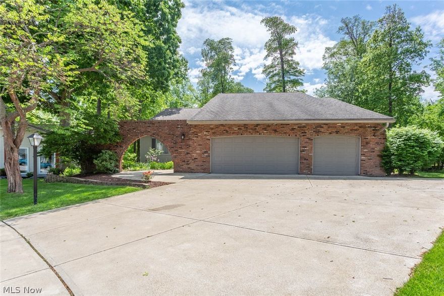 Come see this large contemporary home with plenty of open space.  This home located on a culdesac offers a private wooded lot with lake views from the attached patio in the back yard.  There is no lack of room in this home featuring a second-floor laundry, 3 1/2 car garage, and finished basement and open foyer.  the neighborhood offers plenty of green space including a pool, tennis courts, clubhouse and play areas.