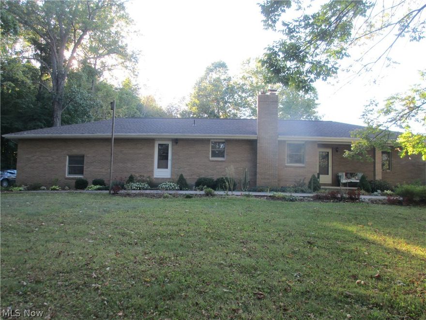 Very Nice 3 Bedroom, 2 full Bath Brick Ranch style home with approximately 1917 sq. ft. of living space.  1 car attached garage with electric and door opener, a 48 x 32 Pole Building with heat and concrete.  Roof is 1 year old, furnace 5-8 years old, 2 whole house fans, concrete circle drive surrounds the house.
