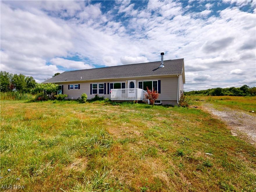 You have to see this one to believe it! This beautifully maintained, 6 years young ranch, has 3024 sq ft of potential living space for the buyer who is looking to finish the upstairs area, built in 2018, sits on 14 acres of open land and offers a rare combination of space, comfort, and potential. Inside, the home features two generous master suites each with large walk-in closets and full baths, brand-new flooring, and fresh paint throughout. The spacious kitchen with island flows into the dining area, perfect for everyday living or entertaining. A cozy family room with a fireplace adds warmth, while the bright living room opens to a peaceful deck through sliding glass doors. The full 2160 sq ft walk-out basement offers 12-foot ceilings ready to be finished into additional living space to fit your needs - whether it's a rec room, gym, guest suite, home office or all of the above. Outside, enjoy plenty of room to roam, play, garden, or simply relax in total privacy. With ample space inside and out, this property is ideal for those seeking a home that offers both modern comfort and endless possibilities.