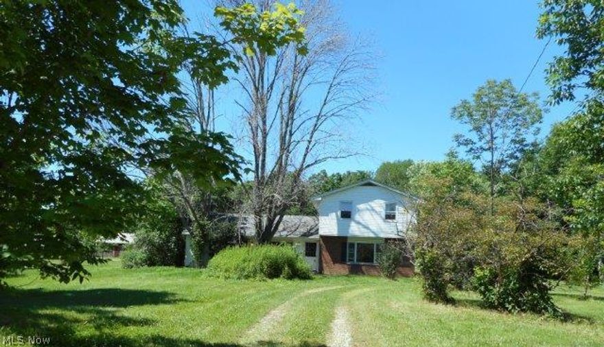 Spacious Brunswick Hills Split Is Nestled On Wooded 1.22 Acre Lot! Huge Family Room Features Wood Floors, Beamed Ceiling and Brick Fireplace. Large Eat-In Kitchen. Full Bath On First and Second Floors. Huge Lot Is Perfect For Summer Entertaining and Room For Outdoor Fun. Offers Loads Of Potential. Live A Country Lifestyle, Yet Close To All City Conveniences! Minutes To Shopping, Freeway Access and Rec Center. Highland Local Schools.