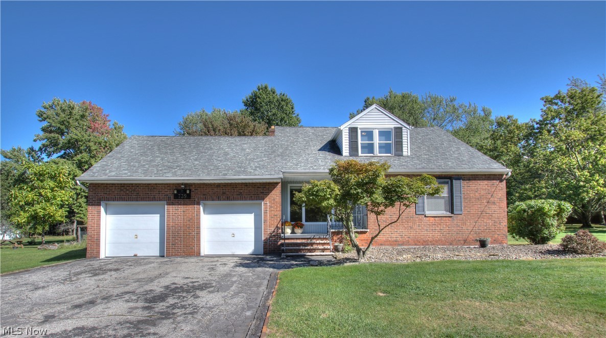 A fresh new look with a motivated seller! Pristine cape cod with impeccable craftsmanship in desirable highland heights. This open concept floor plan offers a spacious kitchen, great room with vaulted ceilings, fireplace, and large eating area. The heart of this home is ideal for entertaining or family gatherings. Large windows overlook a deep wooded lot--a private nature preserve. A gardener's delight with a hidden patio and cozy front porch. Convenient spaces of this home offer much privacy as well. Close to the city park and pool. Large recreation room with fireplace, two utility rooms, heated 2 car garage, extra garage/outbuilding in back, storage space throughout and cedar closet... are just some extra features which make this a wonderful place to call home.