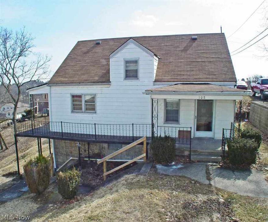 Cute 3 bedroom home priced to sell! Home features hardwood floors on the main level, new vinyl floor in kitchen and both baths, new carpet in both upstairs bedrooms and steps & newly painted throughout the entire house. One car detached garage with workshop underneath. Mechanics dream!