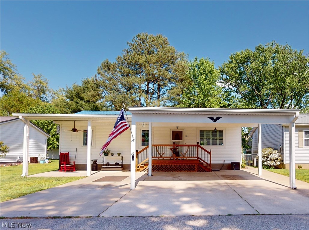Welcome to 754 Tuttle Street in serene Belpre, Ohio. This property is a delightful ranch-style home that harmoniously blends comfort and charm with modern living. With a Home Warranty provided, what's not to love?
On arrival, you will be welcomed by an oversized carport. This space is not merely functional, serving as a shelter for vehicles, but is also a testament to the careful consideration of every aspect of this house. A two-stall expansive carport, convenient, efficient, and well-integrated with the architecture, and offers a warm welcome.
Upon stepping through the front door, you'll find yourself in the freshly updated home. Continuing on, a large eat-in kitchen leading to a beautiful family room with breathtaking pine wall interiors. The atmosphere encourages relaxation, with the promise of many memorable gatherings or peaceful solo evenings.
The ranch-style layout draws on a tradition marked by practicality and comfort. The architecture evokes a sense of home, the one-story design gives the home an accessible, grounded feel. The charm and convenience of single-level living, with rooms that flow seamlessly into each other, enhance everyday living experiences.
Moving forward, a special mention must go to the basement. It offers a blank canvas with unlimited potential. This space can be a haven for hobbies, a gaming room, a personal gym, or perhaps an organized storage area; the choice will be yours to make.
All around, you will notice quality in every detail, reflecting a sincere commitment to create a homey environment. The exterior, too, is charmingly appointed, blending in effortlessly.
In conclusion, 754 Tuttle Street is not just a house, but a place to call home. With its combination of modern conveniences and nostalgic charm, this property offers its inhabitants a beautiful framework to live out their dreams. Awaiting your visit, this place has all the potential to house beautiful futures.