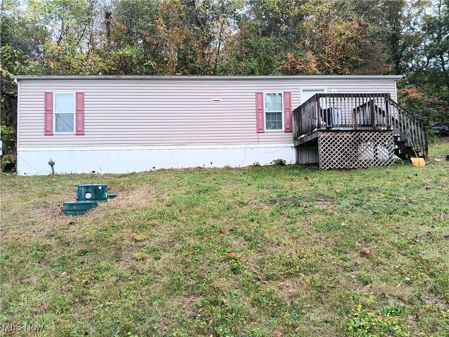 Well kept newer mobile home built in 2013 that sits on almost an acre of land. Close to interstate access and to town, but has a quiet, country setting. Driveway has freshly poured gravel for your convenience! Call today for your private showing!