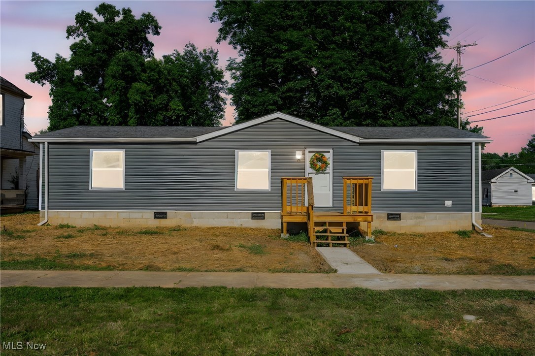 Turnkey perfection! This 3-bed, 2-bath ranch has been completely refreshed from top to bottom—new windows, roof, HVAC (with warranty!), and not a single detail overlooked. Inside, enjoy crisp, clean finishes and a flood of natural light throughout. Step out onto brand-new decks in the front and back, perfect for morning coffee or evening hangs. The primary suite offers its own bath, and the huge backyard—with beautiful shade trees—gives you the space to spread out and relax. Bright. Fresh. Move-in ready. Just bring your stuff. Schedule a tour today!