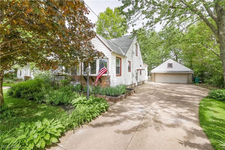 Welcome home and step inside to this completely remodeled cape cod and be delighted with the finishes, use of space, natural light and open layout! This 3 bedroom, 1.5 bath home is open between the kitchen and living area which also has a large walk-in pantry with TONS of shelving! Once you walk in the dining room you will see how open it is between the dining room, family room and back bonus room which has a wood burning stove. There is one bedroom and extra large full bathroom on the main floor. Upstairs you will find the other two adjoining bedrooms with an attached wrap around walk-in closet. Both rooms are spacious and full of natural light! The finished, industrial style rec room in the basement is so unique and full of charm! Outside you will find a gardeners delight, the home has established raised beds with strawberries, rhubarb, raspberry, blackberry and mulberry bushes as well as a fruit producing cherry tree. Beautifully timed perennials greet you along the driveway and as