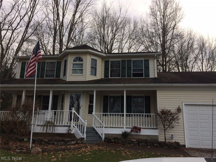 Check out this beautiful home located on almost two acres of RIVER FRONT property in Canal Fulton!  This well maintained 3 bed, 2.5 bath home has lots of space for every day life and for entertaining family and friends.  The family room has a wood fireplace and overlooks a lovey wooded yard that goes back to the Tuscarawas River.  The den also has a fireplace (gas) and it provides a cozy area to relax off the dining room.  There is also a living room and a bonus room/office to provide all the space you need on the main floor, which also includes a half bath and laundry room.  The master bedroom has a lovely sitting area, large walk in closet, and a skylite in the master bath.  Two additional bedrooms and full bath complete the 2nd floor.  Property also has an oversized 3 car garage and two out buildings.  Take advantage of this rare opportunity to own this gorgeous property and schedule your showing today.