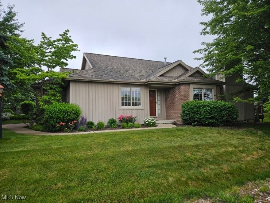 Welcome to 135 Wilford Way in Robin Ridge!  Quaintly nestled on a private lot at the end of the street in one of Tallmadge's most popular condominium neighborhoods!  You won't want to miss out on this absolutely beautiful home!  This ranch style floor plan boasts pride of ownership and offers an incredible amount of space!  4 bedrooms & 2 full baths!  When you step inside the front door you will fall in love with the open floor plan that is accented by a gracious amount of natural light from every angle!  It is gorgeous!  The great room has a vaulted ceiling, fireplace and access to the outside deck area that you will enjoy sitting on taking in the fresh air!  There is a formal dining area with custom built ins, large open kitchen offering quality cabinetry w/pull out shelves, lots of counter space and all appliances!  As you continue through, there is a gracious master suite with a large walk in closet and private bath.  Also, on the main floor you will find a 2nd bdrm, 2nd full bath and laundry room w/appliances.  The lower level offers even more! It is partially finished with 2 more bedrooms and a roughed in home office!  All great additional living space!!  The outside is so private & it's tucked in on the left side at the end of the street!  The newer composite deck overlooks this park like back yard!  You can't beat the privacy, nature, beautiful flowers and landscaping!  This is a must see!