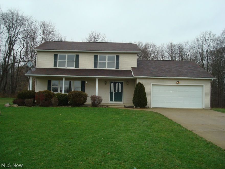 Tucked Away Two Story Situated on 11.77 Acres Features 4 Bedrooms, 2.5 Baths, Great Room/FPL + Living Room, Kitchen, Microwave 2014, Dishwasher 2011, Dining Room + Dinette, 1st Fl. Laundry Area. Most of the Carpeting 2014, Interior Painted 2014. Large Deck 19x31. Your Private Oasis!