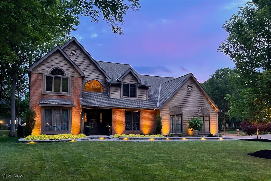 Welcome to this meticulously maintained & beautifully updated home nestled in a lovely neighborhood on a prestigious corner lot. The handsome brick & cedar façade combined w/Andersen 400-series windows, roof tear-off w/50-year shingles & replacement vinyl siding shows the love & care put into this home. The lush manicured front yard is newly landscaped and presents a curved paver walkway w/accent lighting. The backyard is also newly landscaped and offers a lovely patio w/accent lighting perfect for all your entertainment needs or for peaceful relaxing on a beautiful day. A 6’ privacy fence runs along the rear w/5’ aluminum wrought style fence along the sides. A sprinkler system with a zoned RainBird controller and an Alpine Structures shed w/electric is ready for outdoor storage. This immaculate Colonial-style home features 3154 sf w/spacious rooms & an effortless flow. A partial 2-story foyer w/Palladian window allows ample natural light & a formal living/dining room is ready for special family occasions, and French doors lead to a private home office. The inviting kitchen includes newer stainless appliances & a warm breakfast nook w/generous seating that opens to the cozy family room w/wood burning fireplace. The half-bath, main-level laundry (washer/dryer convey), and access to the 2-car, heated garage complete the main level. The upper level features a private primary bedroom w/renovated ensuite including 2 separate walk-in closets, Corian double sink vanity, Jacuzzi jetted tub w/ Corian surround, & Corian shower w/4 body sprays, 2 fixed shower heads, a handheld and seating! 3 spacious bedrooms w/walk-in closets share a renovated hall bathroom with skylight, 8’ double sink vanity, & Corian surround tub/shower. The lower level is partially finished and offers additional living space, abundant storage & updated HVAC. Close to major shopping, restaurants, & the City Recreation Center. Quick and easy commuting to downtown, the airport, & major employment centers.