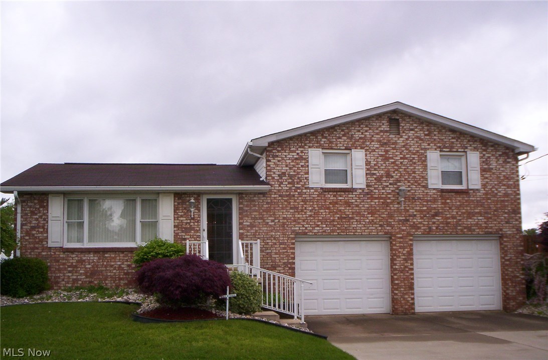 Designed for happy living. This well maintained 3 bedroom home shows a lot of pride. Covered back deck with a fenced in level yard. 2 full baths, rec room, 2 car garage, and remodeled equipped kitchen, wood cabinets, wall to wall built in hutch and desk. A custom kitchen table with chairs adds to the kitchen décor. Many more amenities to see. Don't hesitate call for your private showing.