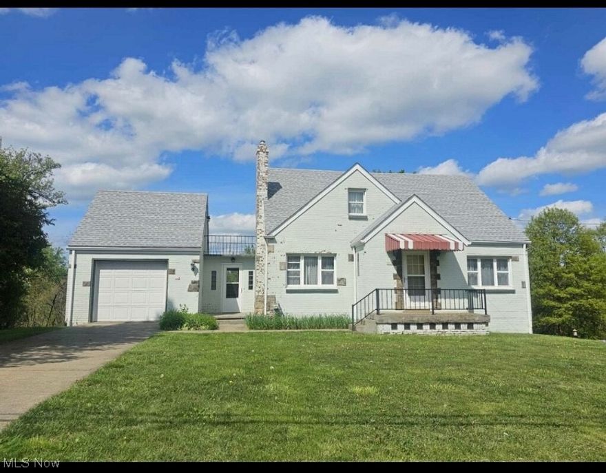 Immaculate 3 BR/2 Bath Cape Cod on 2+ acres features well equipped eat-in kitchen + formal Dining Rm & LR plus main fl Bedroom & bath on 1st level.  2nd floor features 2 bedrooms & full bath.  Newer oak woodwork & doors thru-out w/hardwood floors.  Garage features an add'l workshop or craft space on 2nd level.  Back yard balcony to enjoy nature.