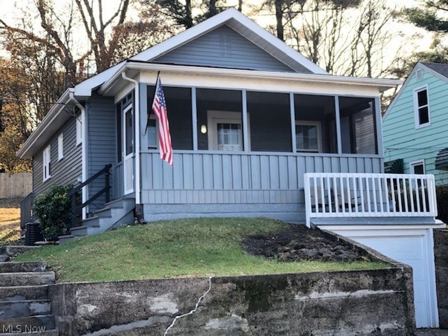 CUTE, CUTE,CUTE.... ALL NEWLY REMODELED. BRAND NEW KITCHEN, BATH, ALL FLOORING, LED LIGHTING,  WINDOWS, ROOF, ELECTRICAL, PAINTED EXTERIOR, SCREENED IN FRONT PORCH, DECK OFF OF KITCHEN, AND MORE. RIDING MOWER STAYS WITH PROPERTY. CALL AGENT TO VIEW.