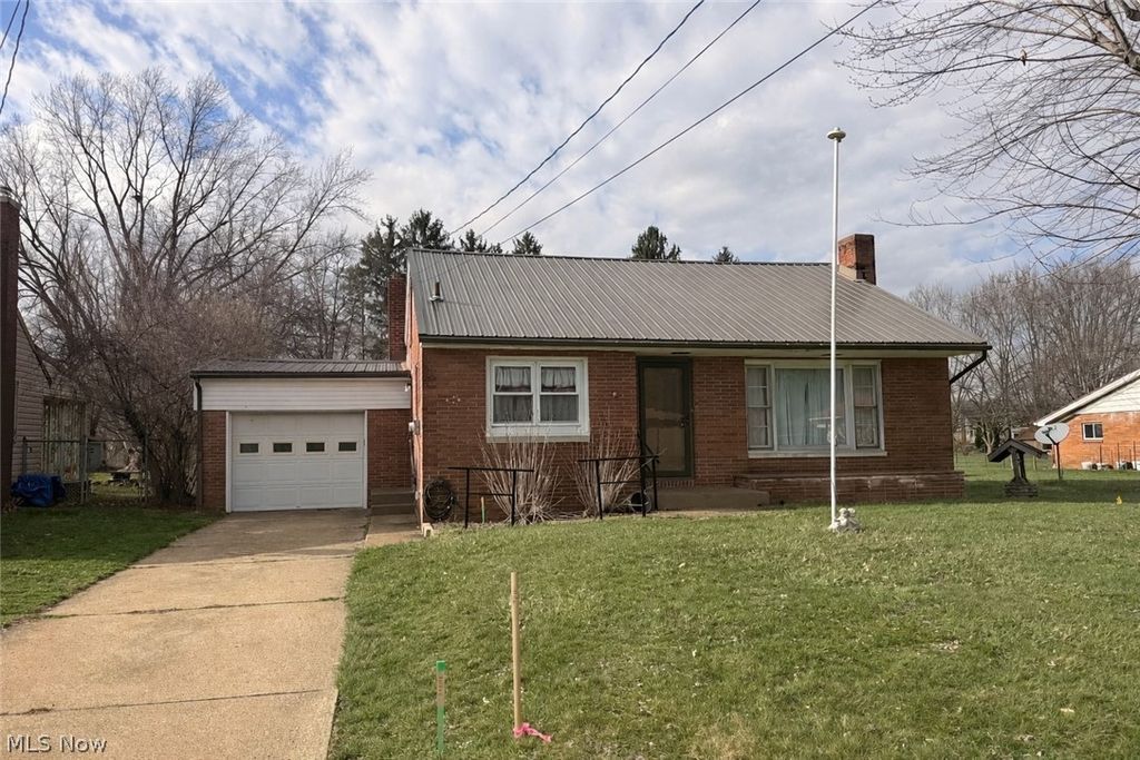 Photo of 712 Mcdaniel Avenue, Minerva, OH 44657 (MLS # 5195615)
