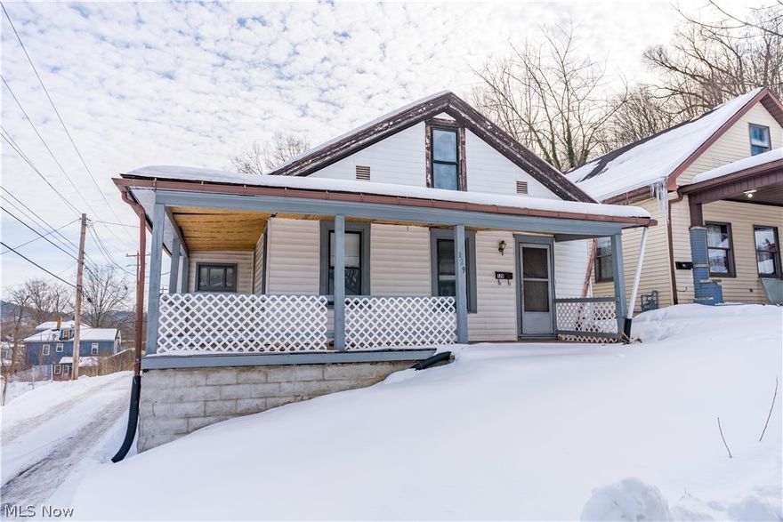 Investment opportunity! Spacious 3-bedroom, 1 full bathroom two-story home offering approximately 2,766 square feet of living space on a 0.17-acre lot in Uhrichsville.This property features a traditional two-story layout with generous room sizes throughout. The main level includes the primary living areas, one bedroom, a full bathroom, and laundry conveniently located on the first floor. Upstairs, you will find two additional bedrooms, providing separation from the main living spaces. The full basement offers additional storage or potential for future improvements. Public water and sewer. Driveway parking. Located within the Claymont City School District. Ideal for investors seeking a rental property, renovation project, or long-term hold opportunity.