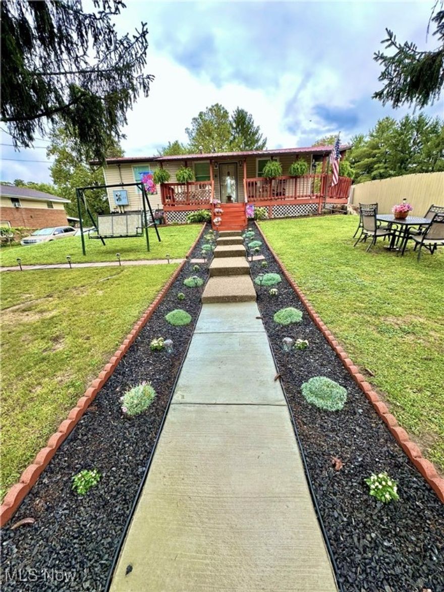 Ranch-style living with a full basement here in Belpre! Nestled on just under a third of an acre, this home is equipped with a metal roof and covered front porch and brick-laid patio out back. Offering luxury vinyl plank flooring in the living, dining, and kitchen with plush carpet in the bedrooms, this home is well-maintained. The full, unfinished basement and two garage spaces offer plenty of opportunity for value-add, simply storing your vehicles, or the perfect space for your projects just the way it is! The value available here at this property with the curb appeal and privacy is unmatched. This is certainly the home you have been waiting for whether it will serve as your primary residence or investment property, it comes ready for its next chapter. Schedule a showing today before the opportunity is claimed!