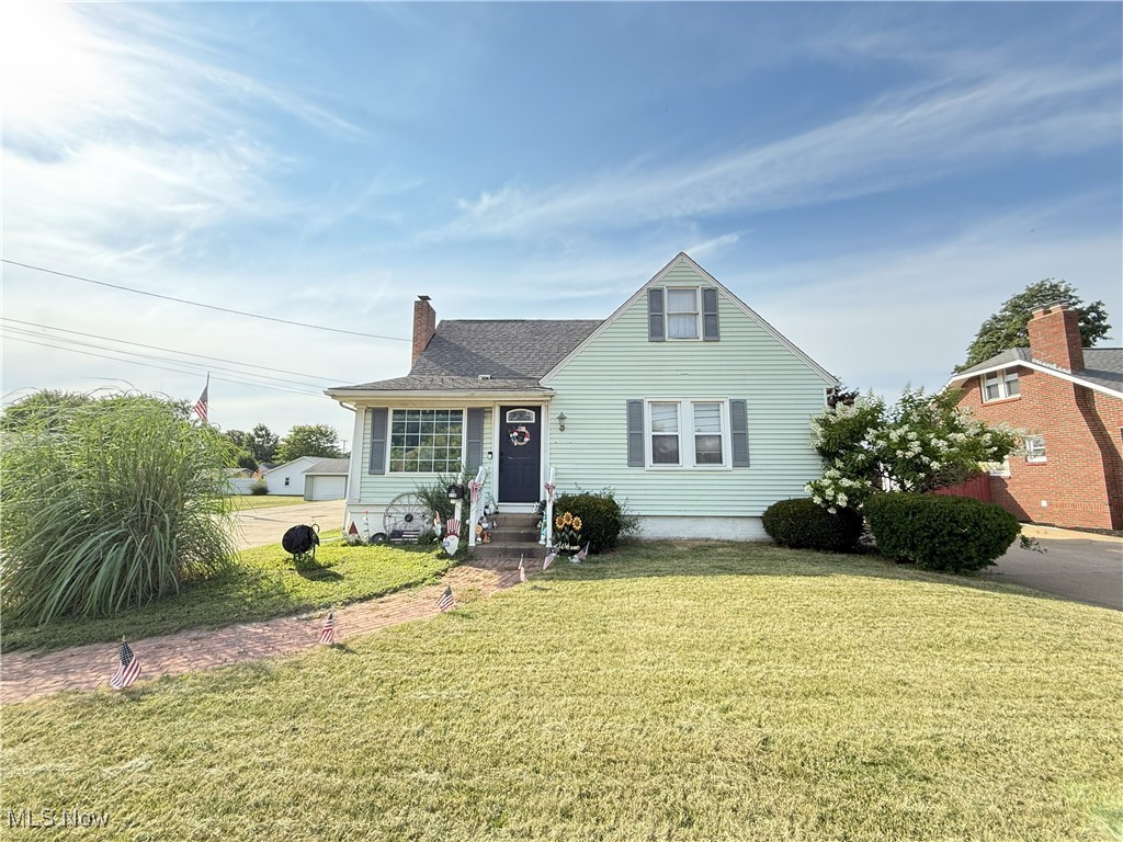 Step inside this beautiful 4 bedrooms and 2 full bathrooms! This charming home in Minerva features archways, original wood floors and an expansive eat in kitchen with vinyl flooring, granite countertops and a lovely window seat overlooking the driveway. The kitchen also features a built-in desk space perfect for school projects. The great room features a painted brick fireplace and lovely wood floors, the great room opens to the foyer with ceramic tile floors, coat closet and plenty of room for your guests to enter. The Full bathroom features a clawfoot tub, built-ins and lots of charm. Two bedrooms complete the main level. Walking up the beautiful staircase leads you to the two larger bedrooms with walk-in closets. The basement is partially finished with a recreational room with second full bathroom with walk-in shower. Also the basement has a generous laundry room with all of the mechanicals of the home behind closed doors. Outside features a generous 24x24 outbuilding, extra large concrete driveway with plenty of parking. You will find a lovely firepit behind the home and a secluded patio/porch off the side of the home, great for hosting and enjoy the Ohio summers. New upgrades include a ring security system, new A/C unit & new paint throughout. This property has a large lot that is close to the Minerva local school system and other local attractions. This home is ready to welcome you with its charm and abundant space!