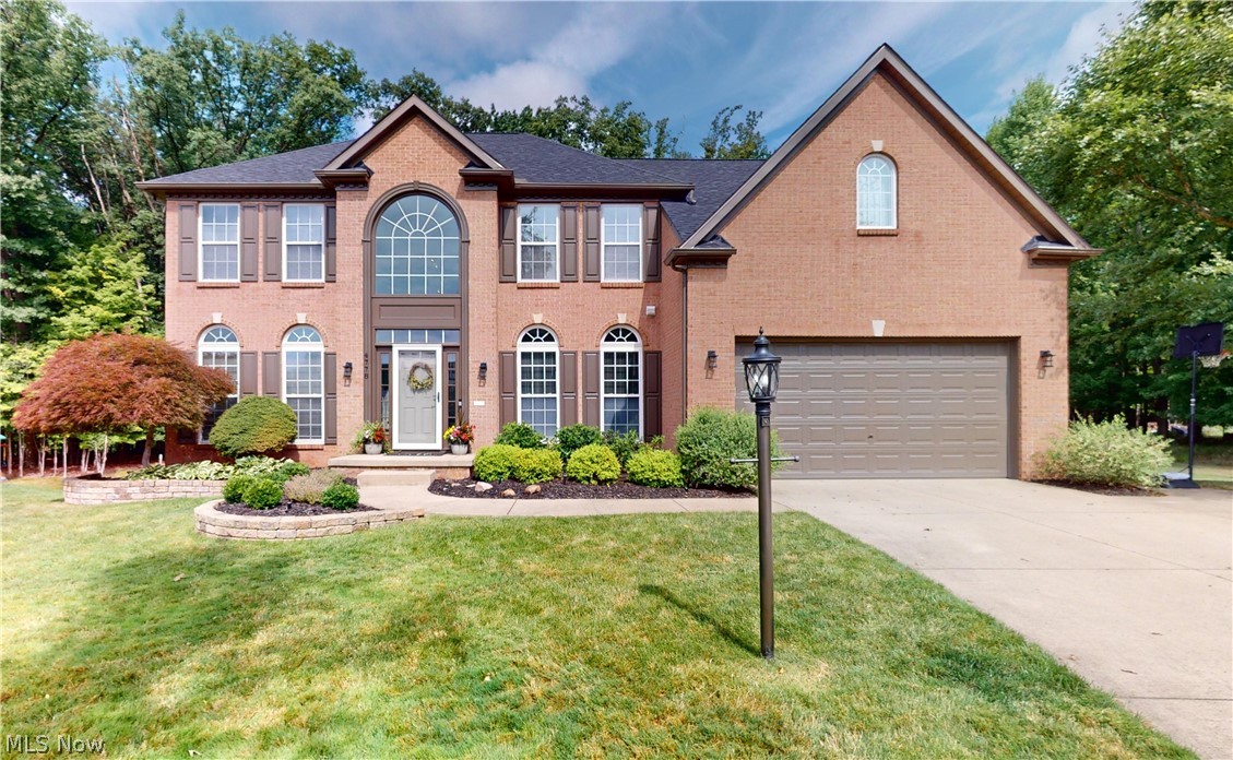 Welcome to this stunning home in Broadview Heights featuring the award winning Brecksville-Broadview school system! This exquisite home, built with quality and integrity in 2004, designed for comfort and style, features 4 spacious bedrooms and 3 full and one half bathrooms. Brand new roof in 2024 along with a new whole house A/C unit(2023) and hot water tank(2022). Sprinker system for both front and rear yards. Situated on an incredible Cul-de-Sac lot which offers beautiful views of the wooded area behind the home. Enjoy family and friends as you entertain on the spacious deck which is accessed easily from the kitchen area. As you enter the home you'll be awed by the 2 story foyer, with a stunning staircase painted in black and white accents. Convenient office to the side of the foyer features French doors. Half bath is located off the hall which leads to a large family room featuring high cathedral ceilings and a cozy gas fireplace. All newer LVT flooring throughout the first floor and all newer carpeting as well. Entire home has been recently painted. Spacious kitchen features newer appliances and granite counters. Beautiful island counter for casual dining. Bright and sunny breakfast room overlooks private back yard which backs up to a wooded area. The Master Suite with a beautifully lit tray ceiling is complemented by a comfortable sitting area and nicely finished bath area. This home is truly a gem located in a wonderful family friendly neighborhood. Walking trails through a wooded ravine close by. Please click on the link above for a virtual walk through tour. Just an amazing home.