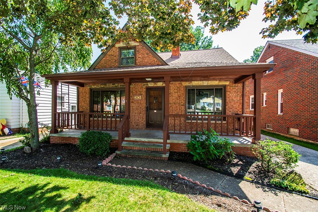A welcoming covered full front porch beckons you to this classic Fairview Park brick bungalow! You'll love the prime location just a stone's throw from Fairview high, rec center and shopping and more. The shaded yard offers an expansive deck and 2.5 car garage with addition creating the ideal hobby/work space! The first level offers a traditional living room, dining room kitchen layout including 2 bedrooms and a full bath. Upstairs you will discover a huge dormer with alcove making the ideal master suite. The lower includes a rec room with easy care nature stone flooring, full bath, bonus room, laundry area and ample storage space. This home is mechanically strong and ready for you!