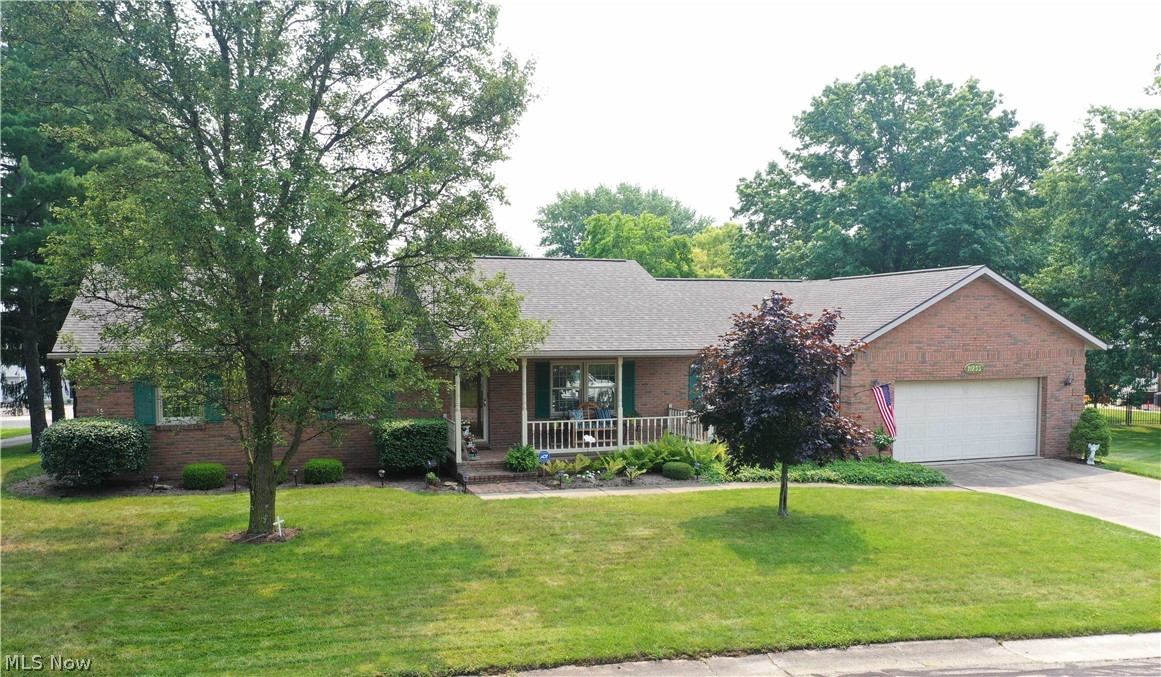 Welcome to this charming, well-maintained brick ranch home. All in one-floor living at its best! The inviting front porch leads you to this adorable, bright, and meticulously cared-for home. The living room has beautiful crown molding with French doors to the formal dining room. The cozy family room features an all brick surround fireplace (wood-burning/gas) with windows on both sides, an access door to the deck (16x18), and a beautiful private backyard. You will enjoy the eat-in kitchen that offers appliances, plenty of cabinets for storage, and a lovely bowed window with a dinette area. The master bedroom has a walk-in closet (8x14) and a master bath. There are two other bedrooms and a full bathroom on this floor. The convenient first-floor laundry room is spacious and has a large closet, a utility sink, and access to the attached tandem three-car garage (man door to the backyard & access to the pull-down attic). This home is in the Tusky Valley School District, in Tuscarawas county.