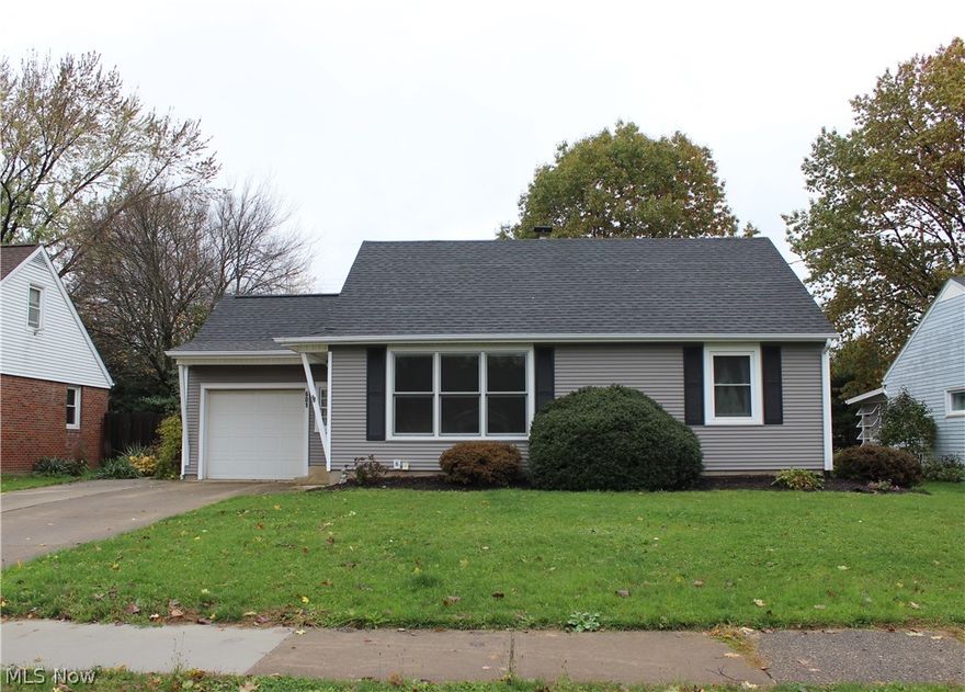 This delightful North Canton Bungalow is packed with updates and offers a great bang for your buck! You'll feel comfy and at home right when you walk into the front door.  The fully fenced, spacious backyard is a wonderful space to enjoy with very nice cedar fencing, and a brand new 16 x 14 Deck, which is a perfect private space to entertain and play.  The updated eat-in Kitchen is graced with nice wood laminate flooring and newer stainless stove, microwave and a handy pantry. There are 2 - 1st floor Bedrooms and 2 - 2nd floor Bedrooms. Each Bedroom is generously sized. The main Bathroom is on the first floor and there's a convenient 1/2 Bathroom located on the 2nd floor.  There's  a lower level Recreation room that adds even more finished square footage, and plenty of additional unfinished basement storage area. Many recent updates include brand new Roof, Siding, Gutters, Furnace, whole-house Humidifier in 2018.  Living Room picture window, Kitchen and 1st floor Bedroom windows were r