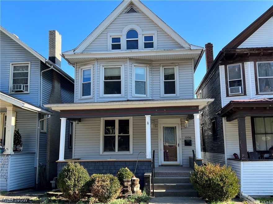 This house may have been built in 1900, check out this nicely updated 2004 Sq ft home with 3 bedrooms, 2 bathrooms, vinyl siding, updated laundry and bathroom on main floor.  Nicely updated kitchen and baths. Beautiful Hardwood floors.. 200 Amp Breaker box with a covered front porch. Some newer windows.