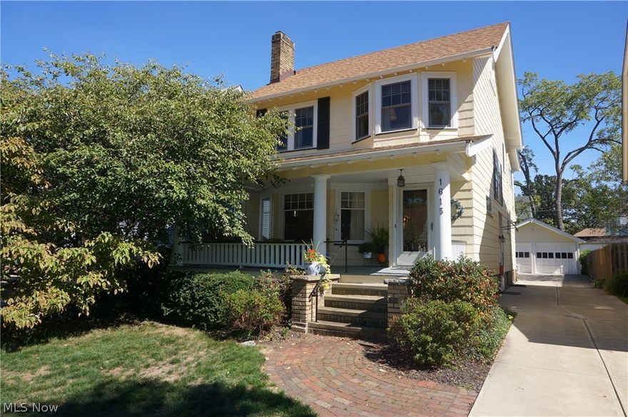 Wonderful curb appeal colonial home located on desireable street in western Lakewood. Covered front porch for your enjoyment. Rear yard with detached two car garage. Direct access to rear yard patio. Inviting front foyer entrance with coat closet & windowed interior door. Living room with bay window, wood floors, crown molding & leaded glass widows. Features painted brick and wood mantled gas fireplace. Living areas have a light and bright feel to them with ample windows. Dining room with wood floors and stunning wall of built-ins. Expansive kitchen with separate eating area. All appliances stay. Second floor bedroom level feature 3 bedrooms, hallway built ins, and updated bathroom. Bath has granite vanity top, built ins, tile shower surround with heated tile floor. Rear enclosed porch on the second floor gives you a great opportunity for x-tra space and features updated windows. The 3rd floor is a true walk up off the hall way and features a landing area. Spacious attic access with wi