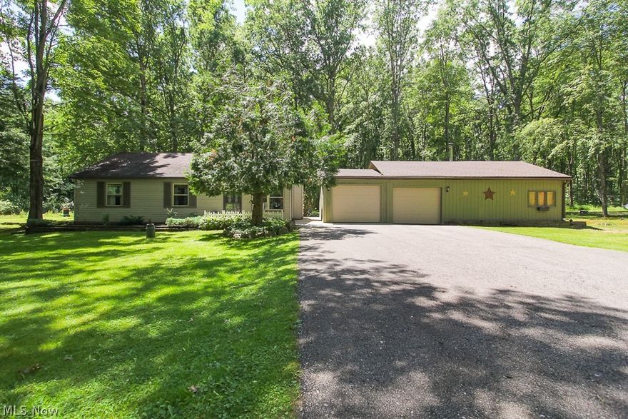 One floor ranch living on a open and spacious 1.7 acre lot! Featuring tall oak trees, plush lawn and great rec space including large 33 X 14 open patio w/ hot tub and 24 X 16 treated wood deck covered by a 16 X 10 Sunsetter adjustable awning! The wild birds are a plenty w/ species from A-Z! The home has been incredibly maintained and updated w/ newer 100% vinyl plank flooring through most of the home. A wonderful open-concept design w/ large living room w/ 0 clearance fireplace w/ fan. Br 3 was opened to accommodate larger living room, can be converted back. Galley kitchen w/ newer laminate tops and dining room features patio doors to rear deck! Remodeled full bath and 1st floor laundry are a real bonus! 3 cars + workshop and add'l shop or storage room available! Check out the pics!