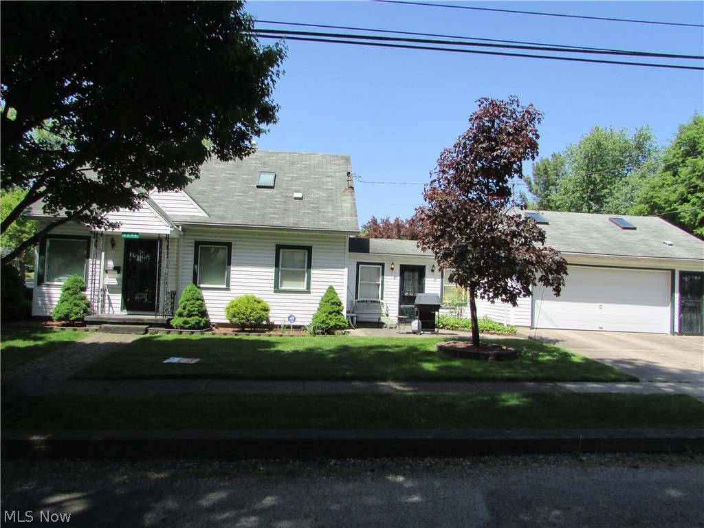A wonderful cape cod with an attached 2 car garage. This home features a large living room, family room, and a finished basement with rec room and bar. The 3rd bedroom is currently used as a dining room, but could easily be converted. The garage has nature stone, is heated, and has a half bathroom (must see it to believe it). The basement has been waterproofed with sump pump, the furnace is newer, and many more updates. A true must see home!