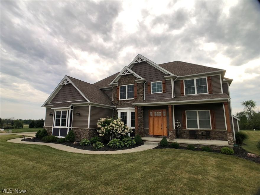 Exceptional Custom Quality and Construction. Skip the building process and just move in! Breathtaking views surround this beautiful home that is loaded with unique features and upgrades. This quiet neighborhood offers natural serenity, rolling meadows, and pond views, but also great highway access, and sits
only minutes away from dining, shopping, parks, and schools. The open kitchen offers ample granite counter top and cabinet space including a
large kitchen island. All stainless steel appliances stay with the house. It's a perfect open layout that flows easily from the
kitchen to the vaulted morning room and vaulted family room with stone mantle fireplace while offering beautiful outside views and natural
light. Sit back and enjoy the breeze from the ceiling fan on the custom-built, covered deck with composite Trex flooring that overlooks this beautiful 2 acre property. Master Bedroom Suite with his & her sinks, glamour jetted bath, and custom tile shower. Large walk-in closet fe