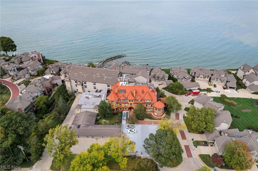 DIRECT LAKEFRONT. Beautifully appointed 2-story penthouse at Cashelmara, Panoramic Lake Erie views above the trees from every room. Facing due North with outstanding Lake Erie views the moment you step in your door! Open floor plan. Hardwood floors. Updated throughout. Gorgeous upgraded and updated high end kitchen with cherry cabinetry, granite counters, and stainless appliances. Abundant storage and workspace. Over-sized island. In suite laundry on the 1st floor.  Simply stunning. Tastefully done. An extraordinary opportunity for easy lifestyle living with a fabulous balcony offering wonderful outdoor space. The 2nd floor features 2 bedrooms and 2 full private baths (including the master with its well organized walk-in closet.) Sunrises and sunsets. Tandem 2 car garage. There's nothing to do here but move in. All the mansion amenities are included (party room, billiards room, saunas, exercise area, pool, etc.) Live in carefree lakefront luxury. Moments to I-90. 15 minutes to downtown. Moments to the to park, tennis courts, and so much more. Public transportation at the door.