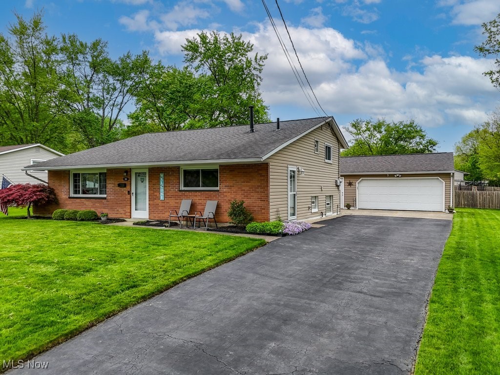 Welcome to 398 Cathy Drive In Munroe Falls! This completely updated home is ready for its new owners! As soon as you enter the home you can tell the love and appreciation this home has. Through the front door you see the beautiful vaulted ceiling that connects you to the completely remodeled kitchen in 2021. Down the steps gives you a ton more options. The large recreation room allows for another potential living area that also connects to a room currently used as an office. The large laundry room awaits you down in the lower level and a full size bathroom! Upstairs you'll find 3 cozy bedrooms and a full bathroom, along with a nice storage access through the hallway closet! Kitchen remodeled in 2021, basement remodeled in 2006, both bathrooms updated in 2023 and the siding was redone in 2010!