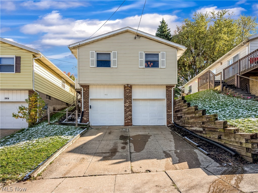 Lovely updated raised ranch home in the Ellet area of Akron. The main level offers open concept living and dining areas with convenient access to the kitchen. The 3 spacious bedrooms and a full size bathroom are located just down the hall. The lower level has additional finished space that could be used for anything you'd like - a home office, family room, rec room, etc. The laundry room and access to the oversized 2-car attached garage completes the lower level. Enjoy a cup of coffee on the deck which leads to the fenced-in backyard. Nothing for you to do except move in!