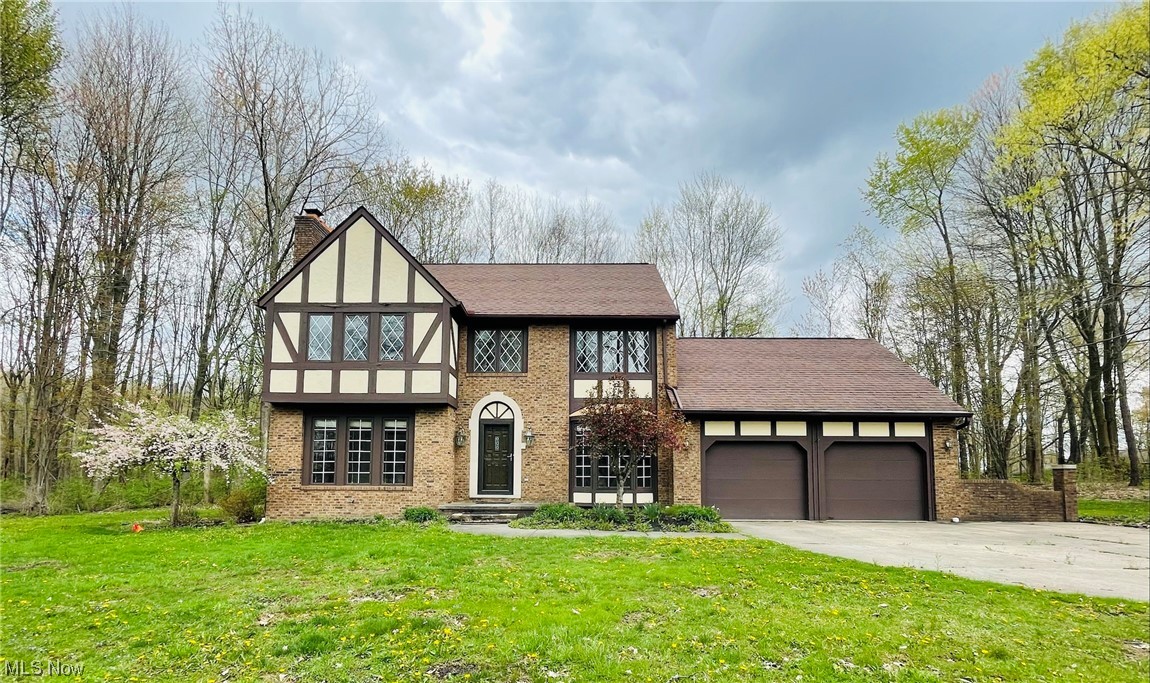 Fabulous 3 bedroom, 2 1/2 bath Tudor on private 1.54 acres and located just 3 miles from LaDue Reservoir and Trails for all your kayaking,
hiking and biking fun. The first floor has a spacious and light filled family room with a gas fire place. Living room with french doors could be
used as an office. The spacious kitchen has an eat-in area, built -in desk, pantry, and comes with all new stainless steel appliances. The formal
dining room is right off the kitchen with access to the rear deck (freshly painted) to enjoy the private and beautiful backyard. A first floor
laundry room and a 1/2 bath down the hall from the kitchen. Second floor master suite with a large walk in closet and a huge master bath with a
shower and soak tub. Two other nice size bedrooms and a full bath complete the upstairs. The house was freshly painted throughout with plenty
updates - new hot water tank- 2021, new AC motor - 2022, new master bedroom carpet - 2022, new floors master closet - 2021, master bath