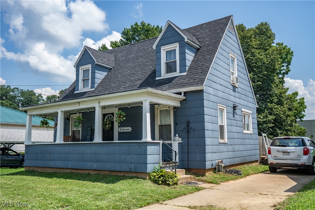 This picturesque 2-story home with covered front porch is conveniently located near shopping, parks and restaurants. It has several updates including some fresh paint, light fixtures, windows, floors, kitchen, bath and roof. The backyard has a privacy fence that offers security for children or pets and there is plenty of off street parking. Call today for an appointment to see.