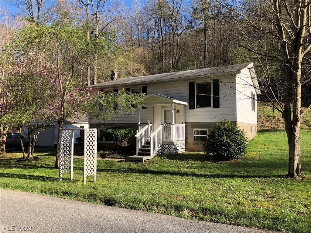 SPLIT LEVEL WITH SPACIOUS YARD OUTSIDE OF TOWN!
Here is a 4 bedroom, 2 full bath home with a detached 24X24 heated garage on over half an acre! Located on a black-topped road, minutes from the conveniences of town but feels like country living. The walk-out basement is finished with a full bath and a large, open family room. This home is priced to sell! Call for details!