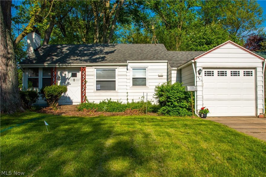 Super cute home!  Nice & bright living room with wood burning fireplace & hardwood floors.  Master bedroom with hardwood floors and two closets and a 2nd bedroom with original hardwood also. Bathroom has new lights & mirror and is in good condition. The kitchen has Corian countertops, new faucet and a chalk board wall! A few steps down and you are in what could be your dining room, play room, family room etc. You decide! It has an additional heating unit to keep it cozy. Adjacent to that is the sun room with a sliding glass door that opens up to the paver patio and pleasant fenced back yard. The home has a full basement with an old school rec room and half bath. Most windows are newer vinyl, electrical upgraded with 100 amp breaker box, newer hot water tank & central air. Roof approximately 10 years old. Furnace & heating unit serviced, cleaned & inspected every year. 1 car attached garage with newer door. NEW SEWER LINE WAS JUST INSTALLED.  Great location, close to Metro parks, shoppi