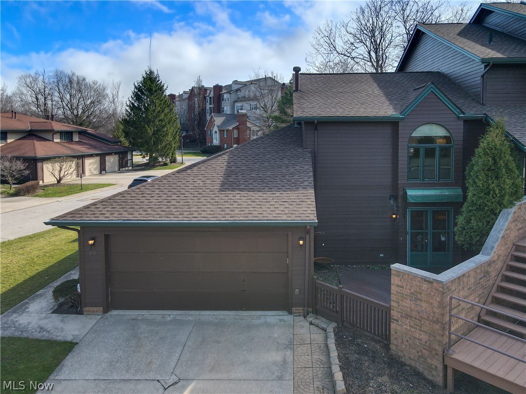 Luxurious living at the gated community of Woodhawk. This open concept floor plan offers an abundance amount of space for entertaining. Walk in through the front foyer door to natural light and high ceilings . Down the hall to the oversize eat in kitchen with granite countertops and SS appliances.(2015) First floor laundry room 1/2 Bath off the 2 car private garage. Large living/ Dinning has 2 story ceilings and French doors that lead into the cozy but large sunroom overlooking the private wrap around patio. The oversized owners suite is on the main level with custom built closets a soaking tub/shower . French doors leading out to a wrap around patio with a privacy fence. The second level offers a full bathroom, second bedroom and a large loft overlooking the living area below. This can be closed off for privacy. Woodhawk amenities include 24 hour gated security, fitness center, club house, 2 pools, tennis courts picnic area with grills. Minutes from Beachwood Mall, Legacy Village, Pinecrest shopping centers and Hillcrest Hospital.