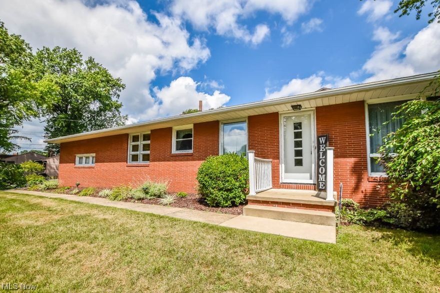 Sprawling all brick ranch in Plain Local schools offering over 1900 sqft of living space! Just inside the foyer entry you'll find the spacious living room with a gas fireplace with stone surround as the focal point. The adjacent kitchen has an area for casual meals, tons of cabinet storage and easy access to the dining room. Down the hall are three generously sized bedrooms with large closets and a shared full bath. A breezeway connects to the 2 car side load garage with room to relax and the perfect drop spot for coats and shoes. If you need more living space, the full basement with a wood burning fireplace is a blank slate just waiting to be finished. With a newer roof, furnace, A/C and hot water tank this home just needs your creative ideas to update the cosmetics. Call to schedule your showing today! (Selling as-is)