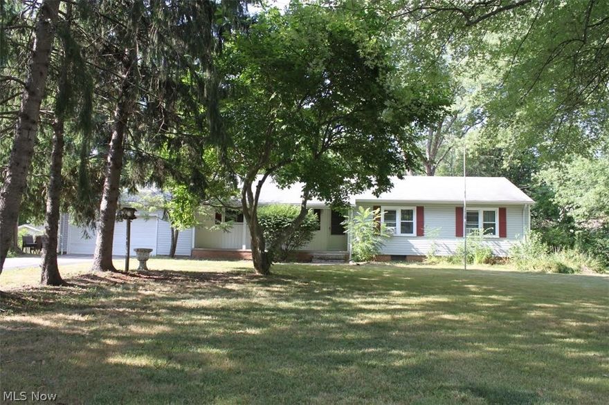 Why rent when you can own your home? This lovely ranch home on Pettibone Rd sits back from the street. Situated on over an acre and a half lot, including the back parcel. Spacious, beamed Great room with brick, wood-burning fireplace, built-in bookshelves, hardwood floor and large windows which overlooks the backyard! Lots of natural light!  Nice kitchen w/appliances including a double oven, white cabinets and dining area. Master bedroom with hardwood floors and adjoining bath. All bedrooms have hardwood floors. Full basement with rec. rm. & workshop. Private rear yard with paver brick patio, expansive decks and storage shed.  One year home warranty included!