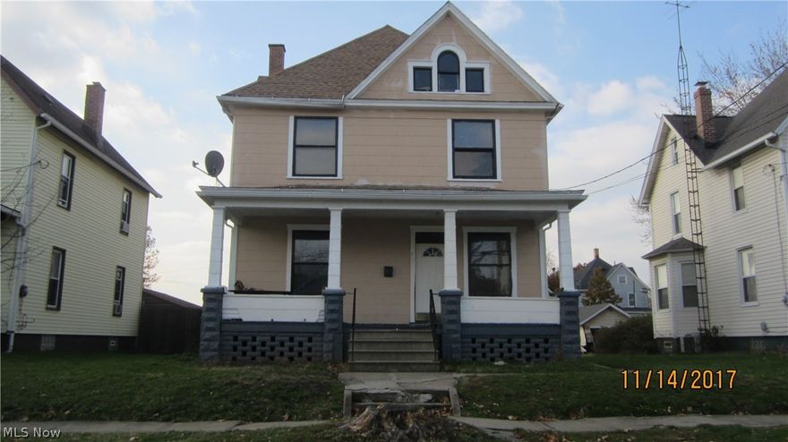 4 bedroom house could easily be converted to 5 bedrooms. Excellent potential money maker. Good foundation.Newer roof, furnace, hot water tank. Many updates to plumbing and electric. Lots of beautiful original features including oak woodwork, pocket doors, hard wood floors, paneled staircase and corner fireplace (condition unknown.) Large attic. Detached 2 car garage off alley in the back.Quiet street but close to hospitals, schools, churches and highways. A little polish will make this a great investment. Also a nice, affordable project for an owner-occupant.