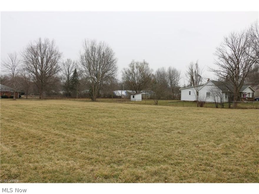 Buildable corner lot with city water and sewer.