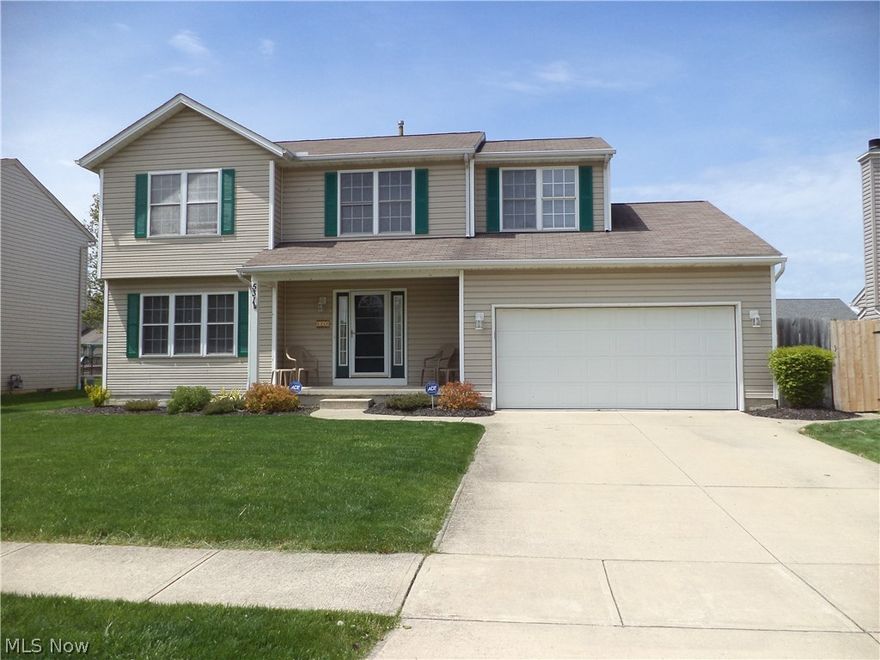 Beautifully maintained large Colonial 1943 sq ft in one of the most desirable location in the city of Elyria. Midview School District. Minutes from Chestnut Commons,highways,medical facilities. 2014 Interior Freshly painted. 2015 New Flooring both bathrooms and utility room. 2014 New Hot Water Tank. 3 Bedrooms on the  2nd floor. 4th Bedroom was converted to a 11x10 Utility Room. 2.5 Baths, Living Room,Dining Room, Eat in Kitchen. Refrigerator doesn't stay Family Room with a gas fireplace and a sliding glass door to spacious fenced in back yard with an newer Nature Stone Patio. Finished Basement, 2 car garage. Ask for the list of all the upgrades that were added during construction.