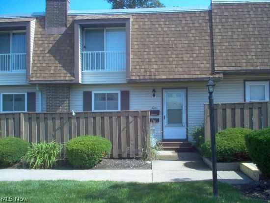 Move in condition! Custom made Amish extra deep wall cabinets & roll out drawers in base cabinets. New carpet throughout. Both baths remodeled with custom vanities and ceramic floors. New roof, furnace and A/C 2017. Windows replaced 2010. View of park from living room. Laminate under carpet in living room.