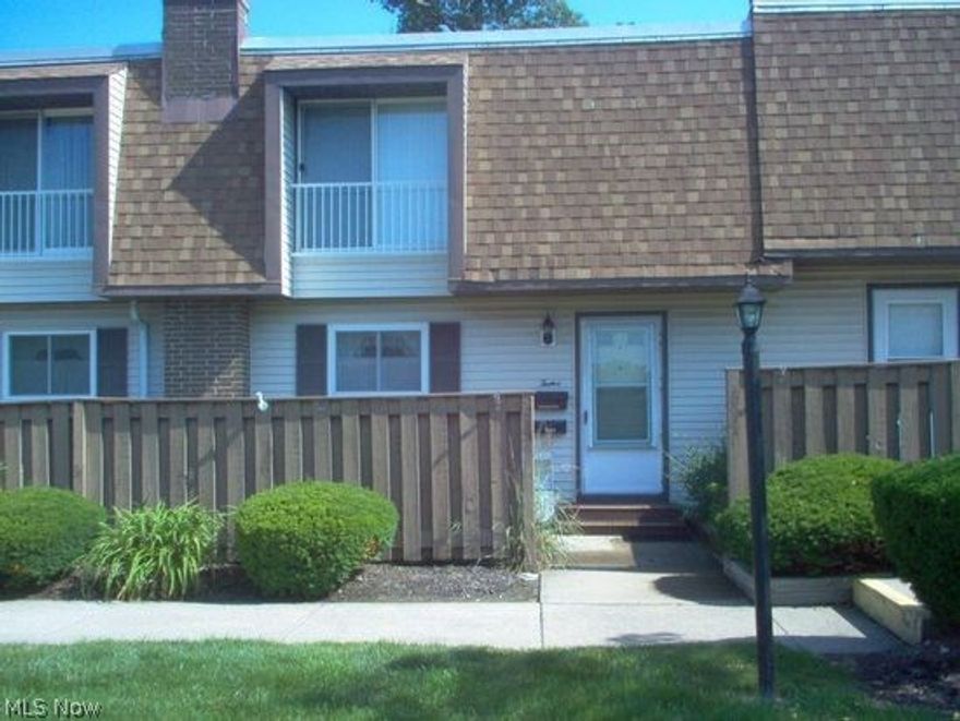 Move in condition! Custom made Amish extra deep wall cabinets & roll out drawers in base cabinets. New carpet throughout. Both baths remodeled with custom vanities and ceramic floors. New roof, furnace and A/C 2017. Windows replaced 2010. View of park from living room. Laminate under carpet in living room.