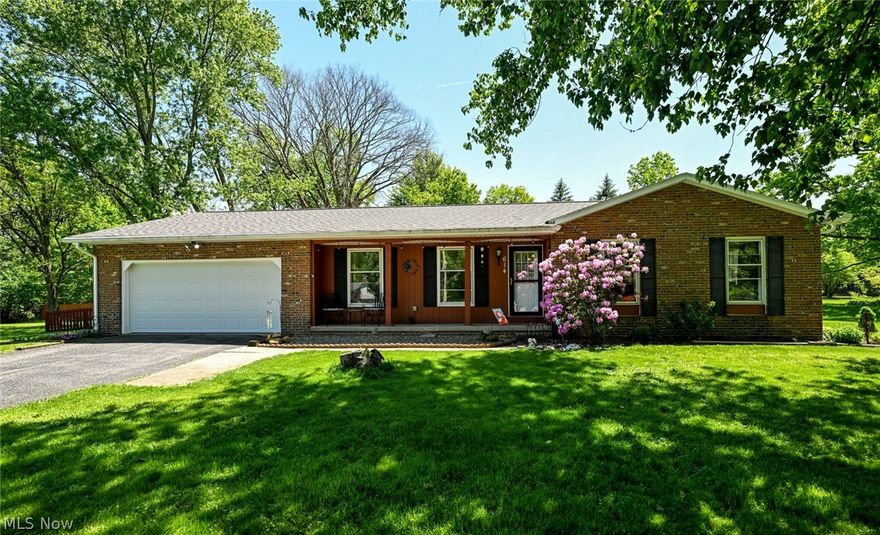Welcome home to this spacious Ranch situated on a beautiful 0.63 acre lot in desirable Hidden Valley.  Offering 3 bedrooms, 2 full baths and over 1,600 square feet of main-level living space, this home features a comfortable and functional floor plan designed for everyday living and entertaining.  A cozy family room and sunroom addition provide flexible living spaces perfect for relaxing, entertaining or enjoying peaceful backyard views year round.  The private owner's suite features its own full bath.  Two additional bedrooms and a second full bathroom are conveniently located on the main level.  The spacious kitchen offers ample cabinetry and workspace with all appliances included.  Additional highlights include LVT flooring throughout, attached 2-car garage, central air (2023), forced air gas heat (2023), hot water tank (2019) and a paved driveway.  The oversized backyard provides plenty of room for outdoor entertaining, gardening or recreation.  Conveniently located near parks, shopping, dining and within the Woodridge Local School District, this well maintained Ranch offers endless potential in a quiet established neighborhood.  Enjoy peaceful surroundings minutes from top local amenities.  Don't miss the opportunity to make this home yours!