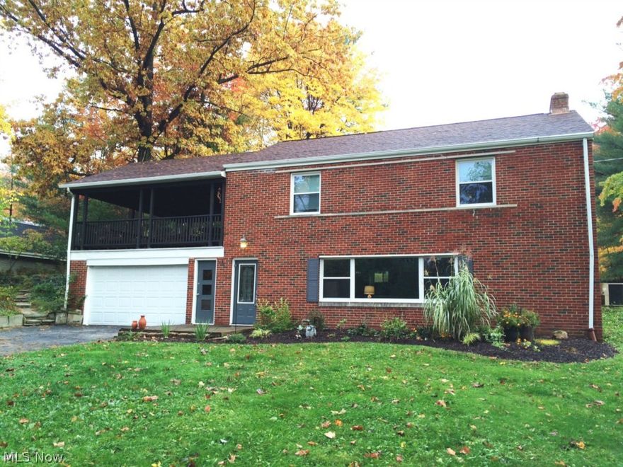 Welcome home! All brick colonial with 1,960 square feet on a beautiful one-acre lot in Brecksville. Many improvements: new roof '07; central air '08; completely new main bath with ceramic tile, new vanity and shower plus soaking tub; new light fixtures; new exterior doors, including garage door; new windows '10; ducts cleaned '14; and updated kitchen cabinets. All rooms have been freshly painted, and the hardwood floors have been refinished throughout. Second floor 20x21 deck, which overlooks wooded lot, has a new roof and is newly stained. New utility tub and ceiling in laundry room. Sharp! Prime location close to I-77 and downtown, and located in the highly rated Brecksville-Broadview Heights School District.