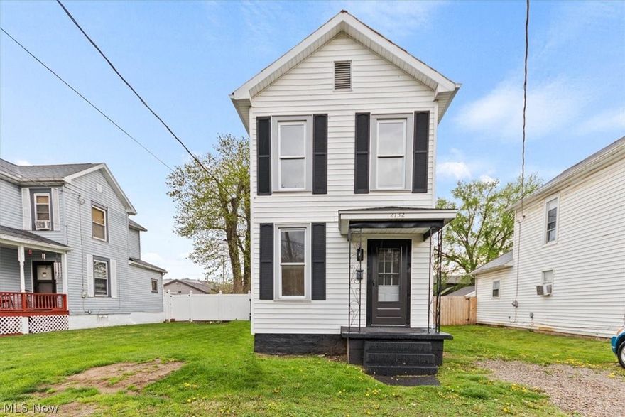 This charming property features two bedrooms and one bathroom, perfect for cozy living. Upgrades include brand new LVP flooring downstairs and plush carpeting upstairs, alongside all-new door hardware. The bathroom has been completely renovated. Additionally, the kitchen has new appliances, butcher block countertops, and freshly painted interiors, complemented by a newly stained deck for outdoor enjoyment.