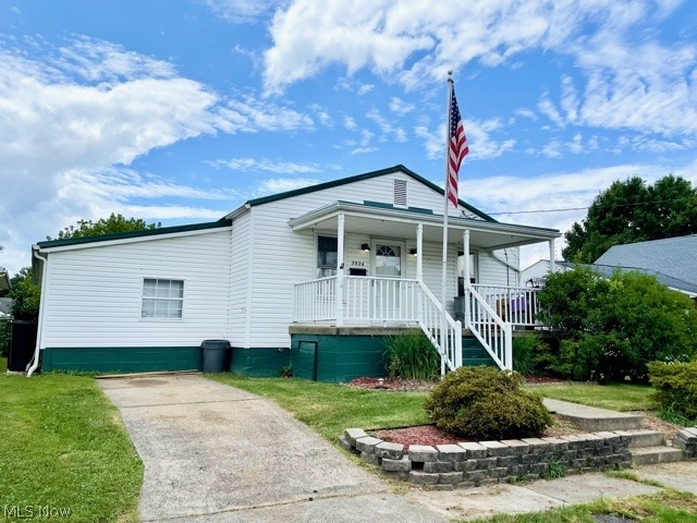 Looking for the perfect starter home for your growing family? Maybe you're ready for an investment property? Either way, this 4 bedroom home is a must see! This spacious bungalow features large rooms, a great layout, level lot, fenced yard, alley access, newer windows, multiple porches, 2 outbuildings, separate areas of off street parking, and so much potential. With just a little TLC and some fresh paint, this one will come to life! The surrounding homes take pride in their properties and you can't help but notice it when you drive down this cute little street. Conveniently located near shopping, schools, restaurants and more. Act fast, before this one is gone!