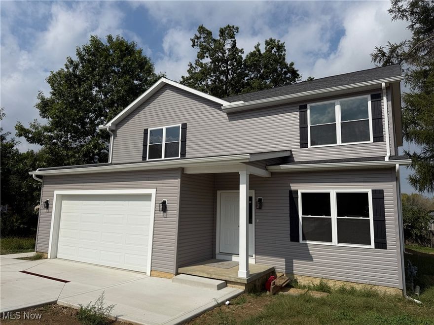 Mentor New Construction! About 2600 sq ft plus a full, unfinished basement. Great colonial layout with entry foyer, office, huge living room, which flows into a spacious dining/kitchen area. Laundry and mud room off the garage, also on the 1st floor. All high-end materials, plywood cabinets (no particle board!) with soft close, dove tail drawers. Upstairs are 4 spacious bedrooms, including a primary bedroom with en-suite bath that includes a huge closet, dual vanities, and soaking tub. Other features: 2-car attached garage, almost .6 acre lot, sliding doors to the back yard, kitchen pantry, tons of storage. Perfect location near shopping, restaurants, schools, freeway access, and more! Several photos show virtual staging.